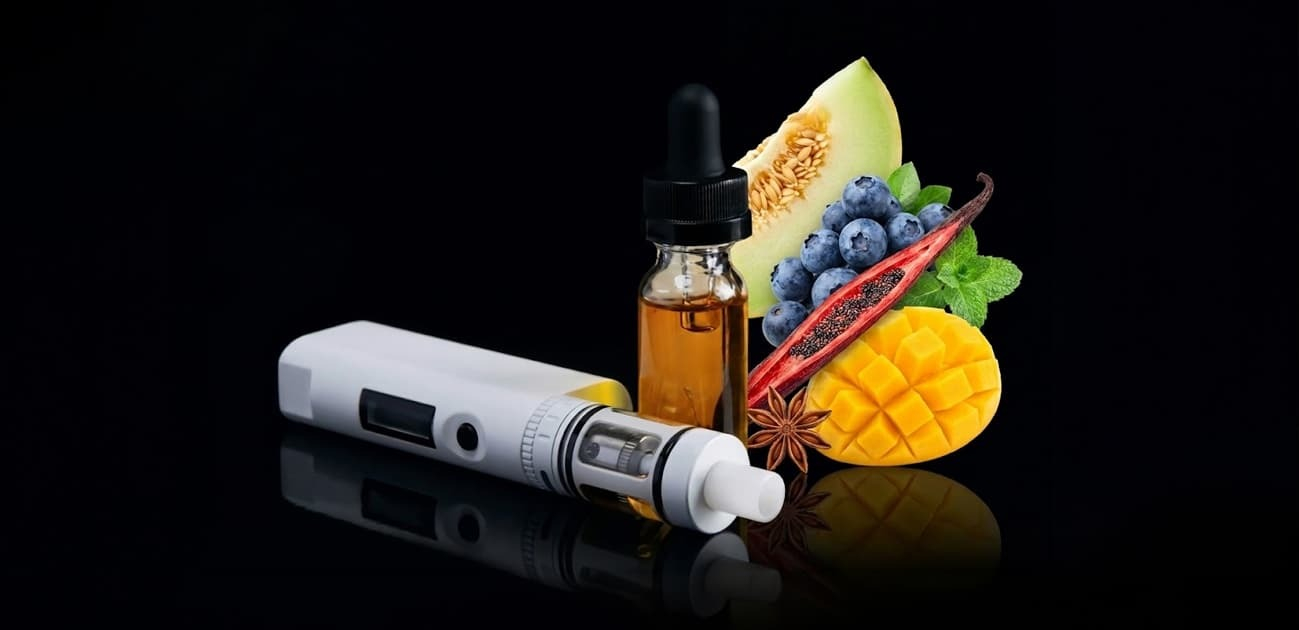 Vape device with e-liquid bottle and assorted fruit flavors including mango, melon, and berries on a dark background.