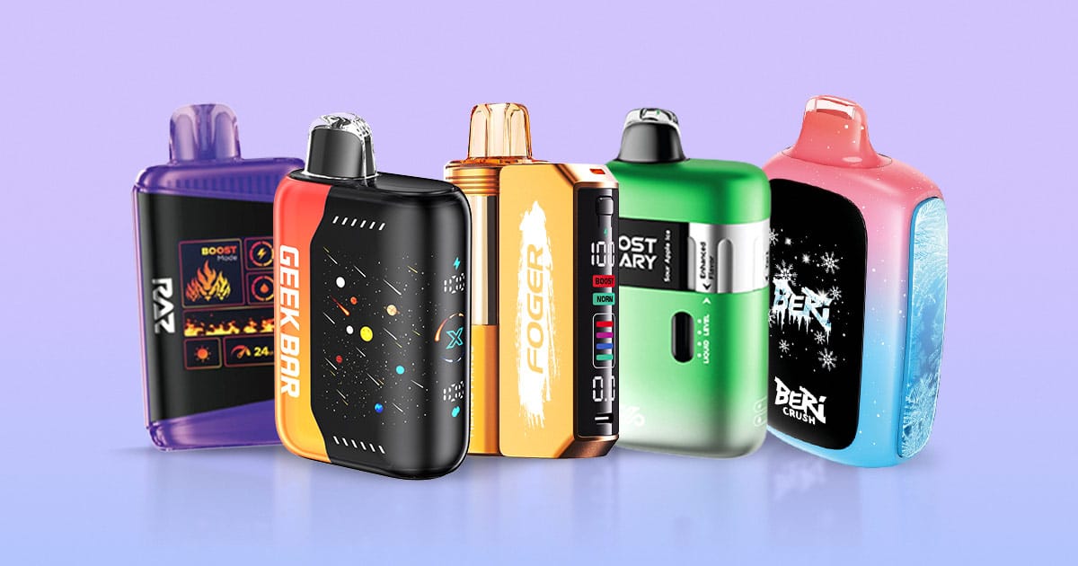 Lineup of top disposable vapes for 2025 featuring popular high-puff devices with colorful designs displayed on a polished surface.